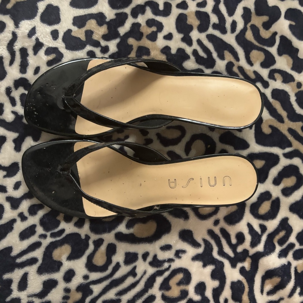 Unisa Black Women's Sandals. Small dog bites barley noticeable